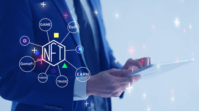 GameFi DeFi futuristic NFT GameFi decentralized finance, online digital technology. Businessman with mobile phone online game graphic icon modern game business investment idea