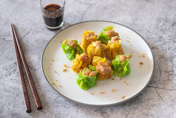 Chinese dumpling and chopsticks as Dim sum traditional Chinese food