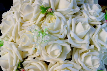 Closeup of a bouquet with white roses.