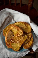 Croutons fried in egg with cheese