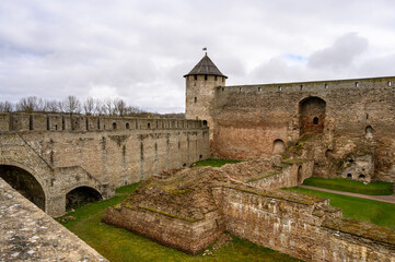 Fototapeta na wymiar Fortress wall Ivangorod. Ivangorod fortress. History of Russia. fortress courtyard