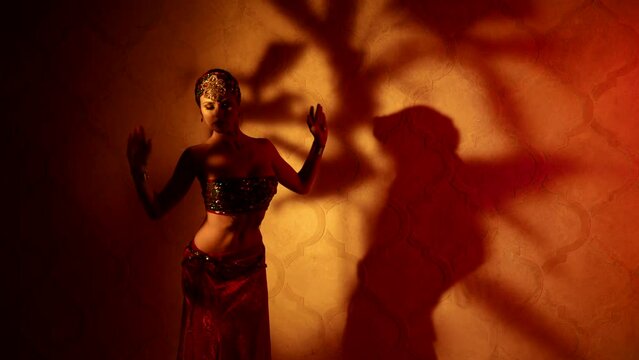 arabic princess or concubines dancing in night in palace, tempting dance performance