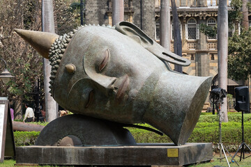 Statue of Buddhas head in the garden of the Prince of Wales Museum, now known as The Chhatrapati...