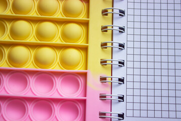 Business and finance concept. On a white-orange surface lies a marker and a notepad with the inscription - UPCOMING EVENTS