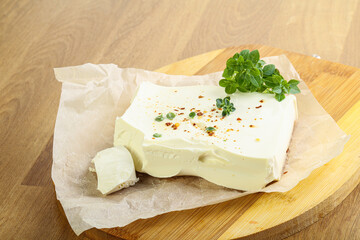 Greek Feta cheese over board
