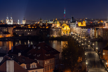 Fototapeta na wymiar Night view of Charles Bridge in Prague from Lesser Town Bridge Tower
