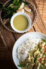 green curry with chicken topping on rice
