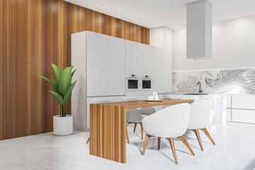 Corner view on bright kitchen room interior with double oven