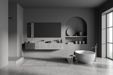 Modern bathroom interior with ceramic bathtub, double sink, mirror, shower. Gray walls, concrete flooring. Panoramic window. 3d rendering.