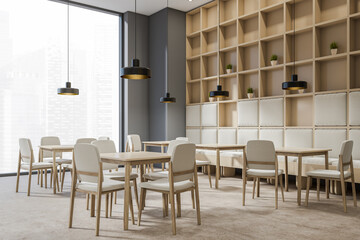 Corner view on dark cafe interior with tables with chairs