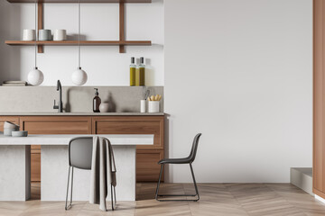 Bright kitchen room interior with empty white wall, dining table