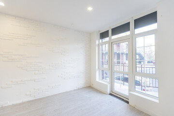 Empty office, big white board on the white wall