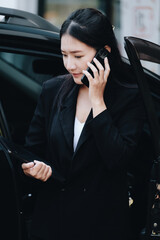 Asian businessmen, business owners, company presidents or female employees talking on the phone and...
