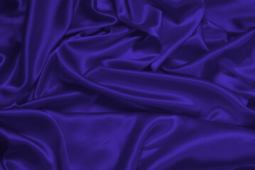 Obraz premium Purple silk or satin luxury fabric texture can use as abstract background.