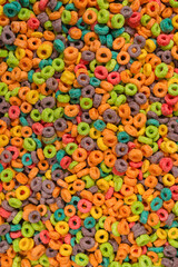 Sweet multicolored flakes, cereal loops.