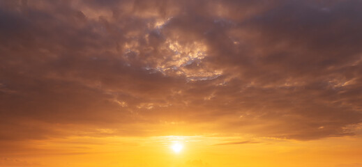 Fototapeta na wymiar beautiful sunrise and orange cloudy sky, panorama nature background