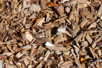Wood chip bark chippings having been shredded for use as a garden mulch by the lumber timber...