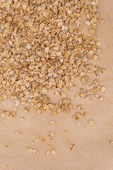 Oatmeal in a spoon.
Healthy oatmeal.
Scattered oatmeal on the table.