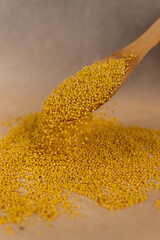 millet in spoon.
millet porridge.
