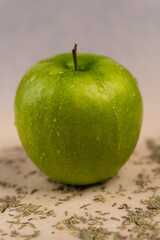 Green apple on the table.
Apple in drops.
Green apple.