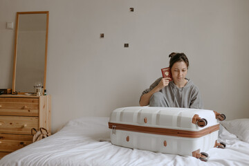 woman with the baggage at home