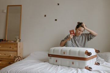 woman with the baggage at home