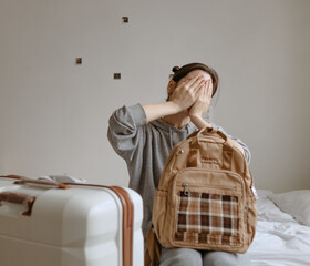 woman with the baggage at home