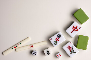 Fototapeta na wymiar Mahjong. Riichi Mahjong set for playing. Space for text.
