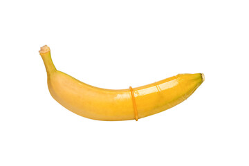 A banana with a condom on it isolated on white background.