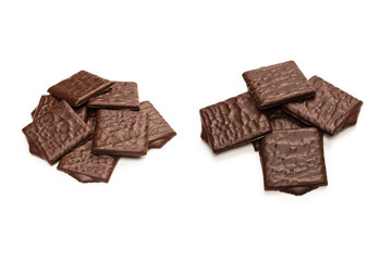 Dark chocolate candies isolated on white background.