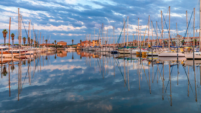 Ships and boats on a beautiful sunset taken in Port Leucate South of France a Mediterranean ladnscape 