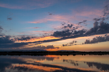 Beautiful sunset taken in Port Leucate South of France with sky reflection in a Mediterranean landscape