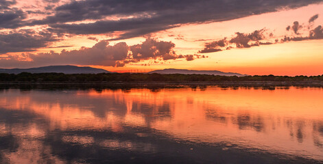 Beautiful sunset taken in Port Leucate South of France with sky reflection in a Mediterranean landscape