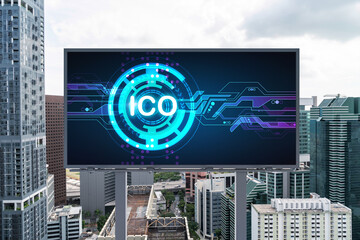 ICO hologram icon on billboard over panorama city view of Singapore at day time. The hub of...