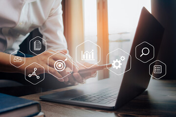 Businessman working with laptop, business analytics concept with digital data diagrams and chart,...