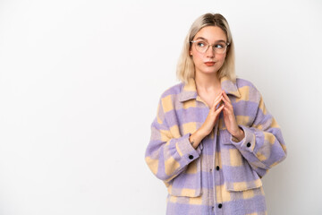 Young caucasian woman isolated on white background scheming something