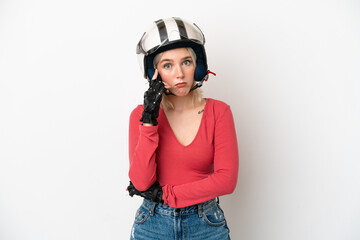 Young caucasian woman with a motorcycle helmet isolated on white background thinking an idea