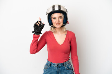 Young caucasian woman with a motorcycle helmet isolated on white background pointing up a great idea