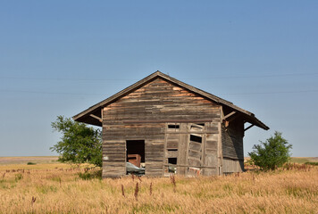 Wooden Structure in a Field in a Ghost Town