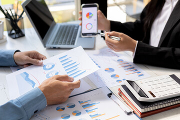 Atmosphere brainstorming session of a startup company, two founders of the company attended a meeting to plan the management and financial growth of the company. Management startup company concept.