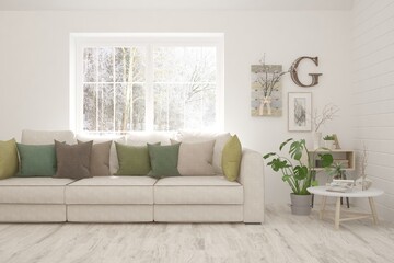 Modern living room in white color with sofa and winter landscape in window. Scandinavian interior design. 3D illustration