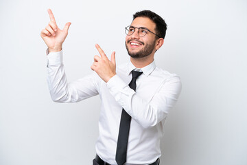 Business Brazilian man isolated on white background pointing with the index finger a great idea