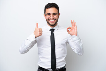 Business Brazilian man isolated on white background showing ok sign and thumb up gesture