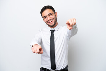 Business Brazilian man isolated on white background points finger at you while smiling