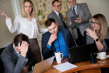 Conflict on business meeting with team.