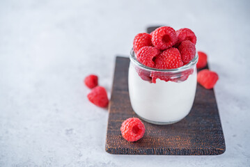Greek yogurt raspberry parfait in jars