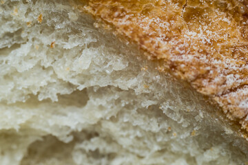 Round loaf of bread, cooked with your own hands in the oven, beautiful crust, lush structure.