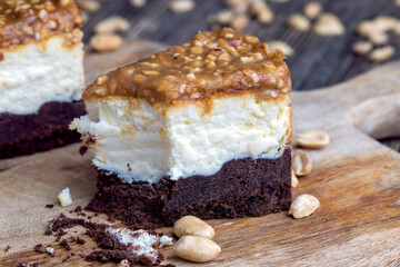 creamy chocolate cake with caramel and roasted peanuts