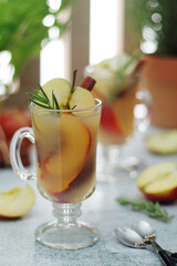 Warm apple autumn drink with cinnamon	