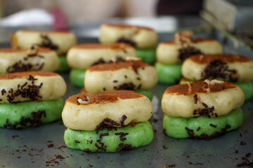 Kue pukis is a cake made from flour dough and cooked in a special mold pan. This cake is made from a mixture of eggs, sugar, wheat flour, yeast and coconut milk.